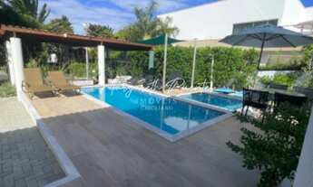 Imagem 4: Casa térrea com 4 suítes, energia solar, piscina mais hidromassagem, varanda c/ churrasque