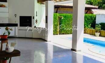 Imagem 3: Casa nascente em condomínio com portaria 24 h e clube na rua principal de Busca Vida, terr