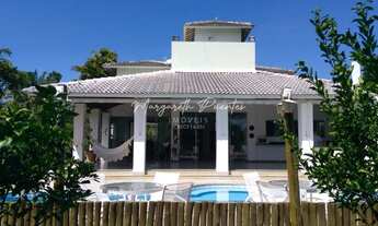 Imagem 5: Casa nascente em condomínio com portaria 24 h e clube na rua principal de Busca Vida, terr