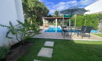 Imagem 2: Casa térrea com 4 suítes, energia solar, piscina mais hidromassagem, varanda c/ churrasque