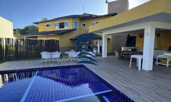 Imagem 3: Casa com 5 suítes climatizadas, armários planejados, sendo 2 com closet e a principal com