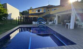 Imagem 5: Casa com 5 suítes climatizadas, armários planejados, sendo 2 com closet e a principal com