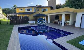 Imagem 4: Casa com 5 suítes climatizadas, armários planejados, sendo 2 com closet e a principal com