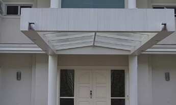 Imagem: Luxuosa mansão em condomínio na cidade