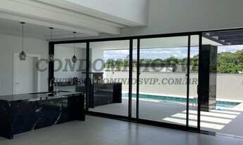 Imagem 3: Casa de luxo em condomínio: 4 quartos, 4 suítes, 3 salas, 6 banheiros e 6 vagas na cidade