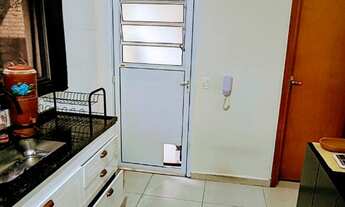 Imagem 7: Encante-se com este charmoso sobrado residencial à venda! Com uma localização privilegiada