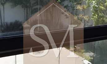 Imagem 3: Imponente Casa Triplex de Luxo com 5 Suítes na Barra da Tijuca - Condomínio Quintas do Rio