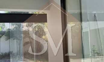 Imagem 4: Imponente Casa Triplex de Luxo com 5 Suítes na Barra da Tijuca - Condomínio Quintas do Rio