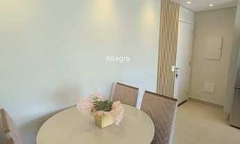 Imagem 2: Apartamento com 2 varandas, 2 quartos, vaga demarcada e escriturada, localizado em uma áre