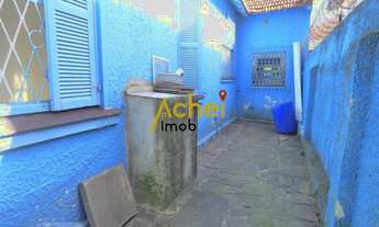 Imagem 2: Acheimob vende Casa de três dormitórios, três banheiros e quatro vagas na garagem, no bair