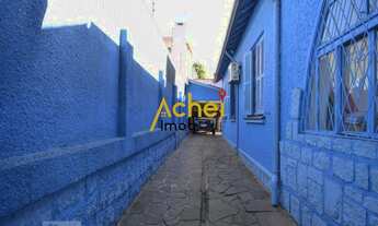 Imagem 3: Acheimob vende Casa de três dormitórios, três banheiros e quatro vagas na garagem, no bair