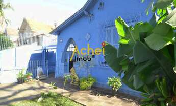 Imagem 1: Acheimob vende Casa de três dormitórios, três banheiros e quatro vagas na garagem, no bair