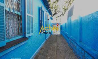 Imagem 4: Acheimob vende Casa de três dormitórios, três banheiros e quatro vagas na garagem, no bair