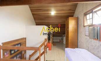 Imagem 3: Sobrado com três quartos, sendo dois suites no bairro Guarujá, com vaga para dois carros