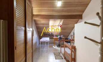 Imagem 4: Sobrado com três quartos, sendo dois suites no bairro Guarujá, com vaga para dois carros