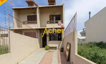 Imagem: Sobrado com três quartos, sendo dois suites