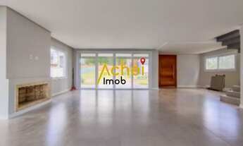 Imagem 2: Casa de Condomínio à Venda em Porto Alegre-RS: 3 Quartos, 3 Suítes, 5 Banheiros, 2 Vagas d