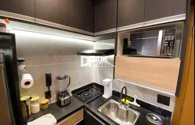 Imagem 5: Apartamento em hotel que oferece a conveniência de serviços hoteleiros, como limpeza regul