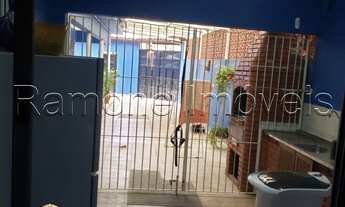 Imagem 4: Vende-se casa térrea com 163m2, com 3 dorms e 4 vagas de garagem. Localizada no bairro Qui