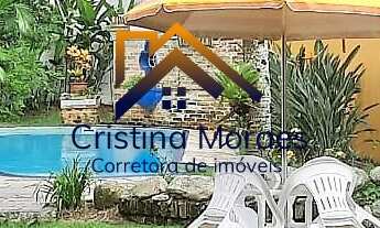 Imagem 6: Casa em estilo rústico, com 4 dormitórios, no Condomínio Morada da praia