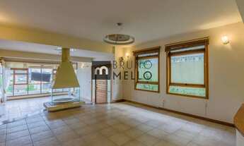 Imagem 3: Casa ampla de 694 m² com 4 suítes, escritórios, 7 vagas de garagem e terreno de 929 m² com