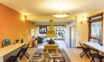 Imagem 6: Casa ampla de 694 m² com 4 suítes, escritórios, 7 vagas de garagem e terreno de 929 m² com