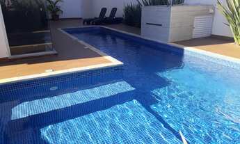 Imagem: 3 dormitórios, 3 suíte, 4 vagas na garagem