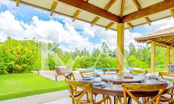 Imagem 6: Mansão com arquitetura litorânea e total conexão com a natureza à venda no Terras de São J