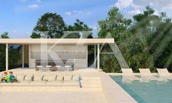 Imagem 2: Casa de Vidro com ambientes amplos e sofisticados, descubra a exclusividade e o luxo no co