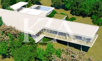 Imagem 4: Casa de Vidro com ambientes amplos e sofisticados, descubra a exclusividade e o luxo no co