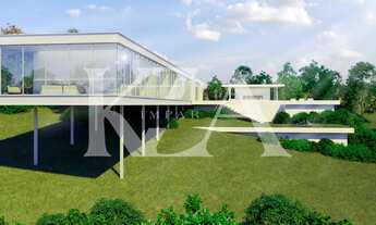 Imagem 5: Casa de Vidro com ambientes amplos e sofisticados, descubra a exclusividade e o luxo no co