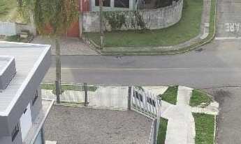 Imagem 5: Amplo terreno com casa contendo 3 dormitórios sendo 1 suíte, banheiro social, sala e cozin