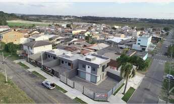 Imagem 3: Amplo terreno com casa contendo 3 dormitórios sendo 1 suíte, banheiro social, sala e cozin