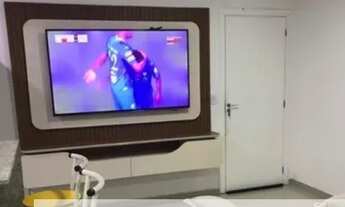 Imagem 5: Apartamento com 2 quartos, sala de estar e sala de jantar integradas, cozinha e sacada com