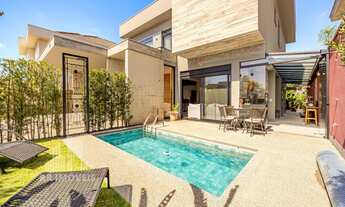 Imagem 2: RR8504 Casa 330m² CONDOMÍNIO GENESIS I - OPORTUNIDADE - 4 Suítes 4 Vagas - Santana de Parn