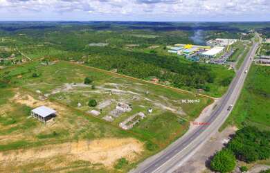 Imagem 3: Vendo terreno medindo 18.000 m2 ao lado da BR 101, trecho ao fundo da Mercedes-Benz Caminh