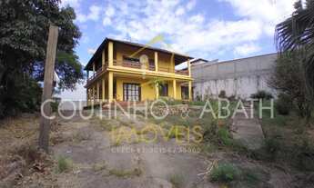 Imagem: CASA NO MORRO DA CRUZ COM VISTA PARA A LAGOA