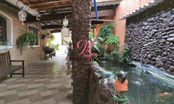 Imagem 3: Imóvel Exclusivo no Jardim Marcheti: Casa com 3 Quartos, 1 Suíte, 2 Salas e 4 Vagas de Gar