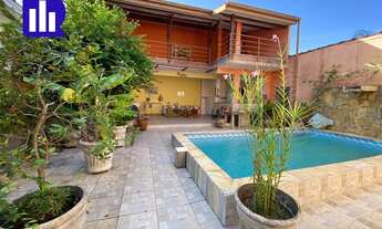 Imagem 1: Casa, com 4 dormitórios, sendo 2 suítes, 3 vagas de garagem cobertas, no Itaguá, em Ubatub