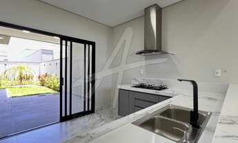 Imagem 3: Casa com 3 suítes e 4 vagas de garagem