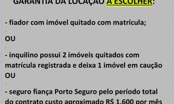Imagem 5: Apresentamos um galpão comercial com 2 salas, 2 banheiros, 6 vagas de garagem e uma área t
