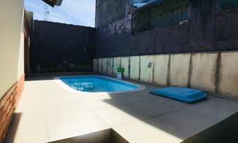 Imagem 2: Compre casa com 2 quartos sendo 1 suíte , piscina e churrasqueira . Praia das palmeiras