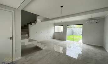 Imagem 3: Sobrado geminado a venda em condomínio fechado com tres quartos sendo uma suite no bairro