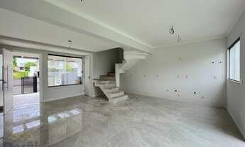 Imagem 2: Sobrado geminado a venda em condomínio fechado com tres quartos sendo uma suite no bairro