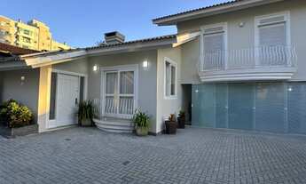Imagem 1: Casa com 3 dormitorios sendo 1 suite e 5 salas comerciais na frente no bairro Anita Gariba