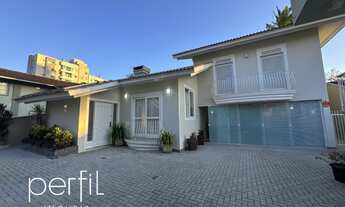 Imagem 3: Casa com 3 dormitorios sendo 1 suite e 5 salas comerciais na frente no bairro Anita Gariba