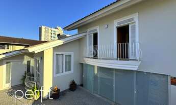 Imagem 7: Casa com 3 dormitorios sendo 1 suite e 5 salas comerciais na frente no bairro Anita Gariba