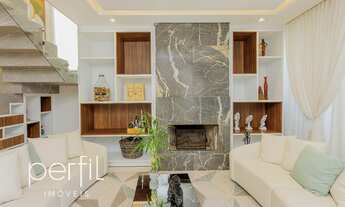 Imagem 2: Casa porteira fechada com 3 suítes e 3 vagas de garagem cobertas em condomínio fechado no