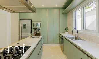 Imagem 7: Casa porteira fechada com 3 suítes e 3 vagas de garagem cobertas em condomínio fechado no