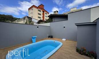 Imagem 5: Sobrado a venda 100% MOBILIADO com três quartos sendo uma suíte no bairro Santo Antônio